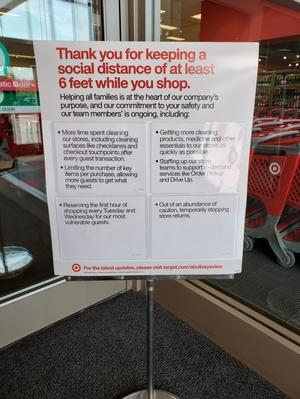 [COVID-19 social distancing signage at Target in Denton]