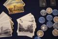 Photograph: [Postcards and buttons from the Dallas Historical Society]