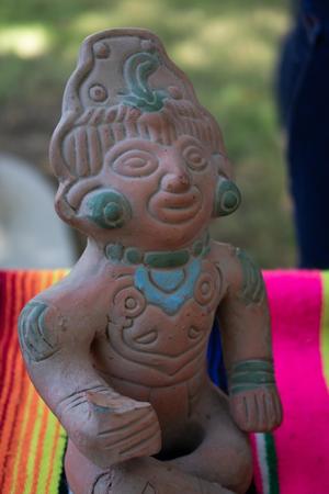 [Terracotta pottery figure]