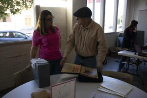 [Preservationist volunteer and guest at Archives Bazaar]