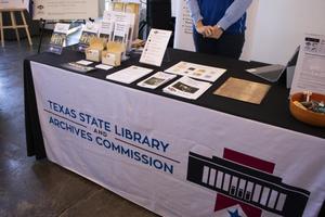 [Texas State Library and Archives Commission table at Archives Bazaar]