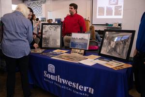 Primary view of object titled '[Southwestern Baptist Theological Seminary table at Archives Bazaar]'.