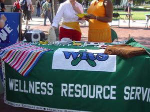 [Wellness Resource Services booth]