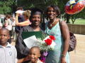Primary view of [Graduate with family and flowers]