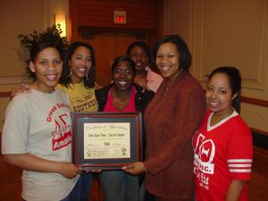 [Delta Sigma Theta members with certificate]