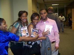 [A group of students holding DVDs, 2]