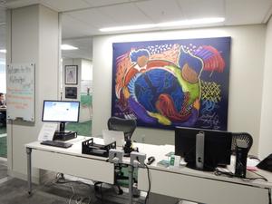 [Front desk and mural in MC office 3]