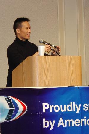 [B. D. Wong speaking from podium]