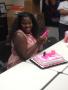 Photograph: [Briana with her birthday cake]