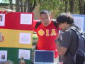 Photograph: [Students near 2008 Bolivia booth]