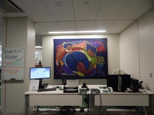 [Front desk and mural in MC office 1]