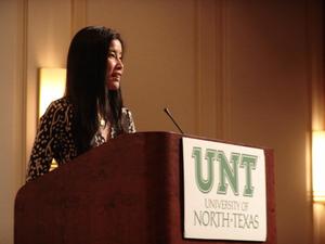 [Lisa Ling speaking behind UNT podium]