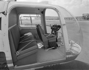 [The cockpit of a Bell Ranger helicopter]