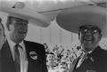 Photograph: [Frank Cuellar Jr. and John Wayne]