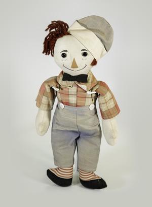 [Raggedy Andy doll]