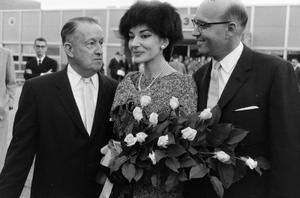 [Maria Callas and two male escorts at Love Field]