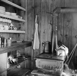 [Photograph of an old kitchen interior]