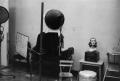 Photograph: [Photograph of a room with photography equipment and a mannequin head]