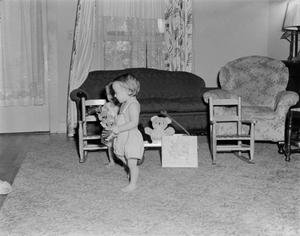 [Photograph of Byrd IV and Pam as toddlers in a living room]
