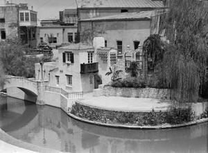 [Photograph of the outdoor stage of the Arneson River Theater on the River Walk]