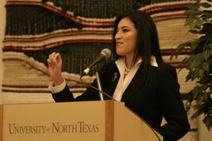 [Young woman speaking at 2004 La Raza event 6]