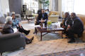 Photograph: [Board members in lounge at 2012 TABPHE conference]