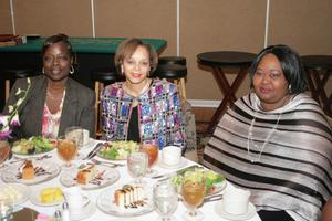 [Three women seated at 2012 TABPHE banquet]