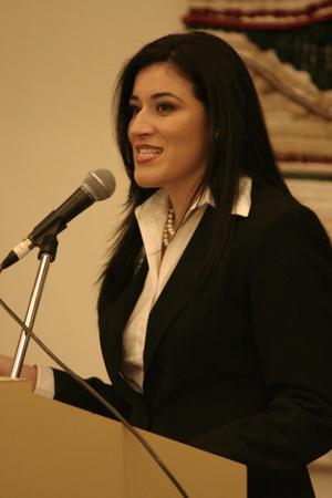 [Young woman speaking at 2004 La Raza event 2]