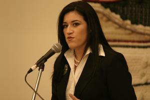 [Young woman speaking at 2004 La Raza event 3]