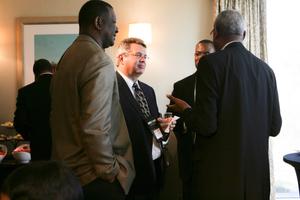 [Men at reception at 2012 TABPHE conference]