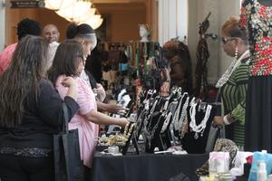 [Women looking at jewelry at 2012 TABPHE conference 2]