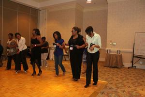 [Women lined up to dance at 2012 TABPHE conference 4]