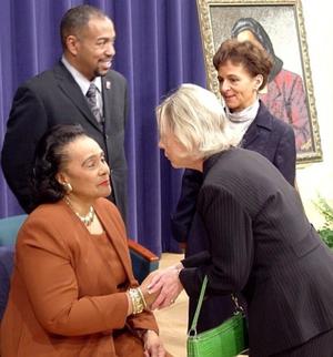 [Coretta Scott King shaking hands with a guest]