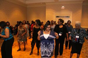 [Women learning dance at 2012 TABPHE conference 6]