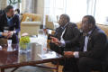 Photograph: [Dr.Rod Fluker and others in lounge at 2012 TABPHE conference]