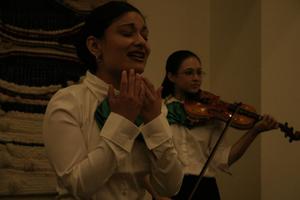 [Singer and violinist at 2004 La Raza event]