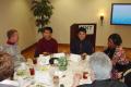 Primary view of [B. D. Wong and attendees at banquet table]