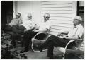 Thumbnail image of item number 1 in: '[Four Jack Daniel's employees on porch]'.