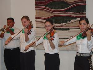 [Mariachi violinists at 15th Annual Celebración Banquet]