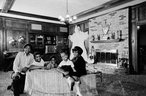 Primary view of object titled '[Charley Pride with his family in a living room, 6]'.