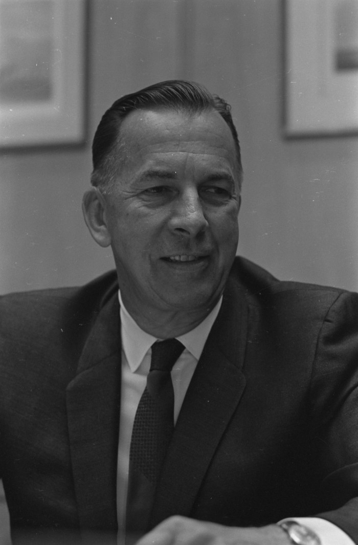 Portrait of Ed Cole in a suit and tie, 4] - UNT Digital Library