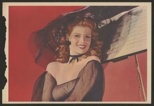 [Magazine Color Photo of Redhead by Music Stand]