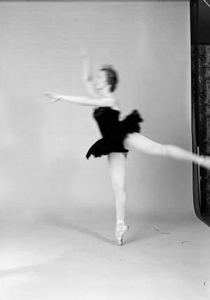 [A ballet dancer in a studio]