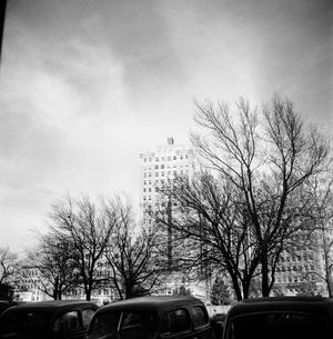 [City buildings and automobiles]