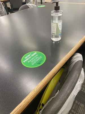 [Social distancing table sticker signage]