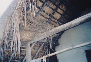 Photograph inside a traditional Kom house