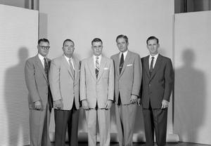 [Group of five men in formal attire]