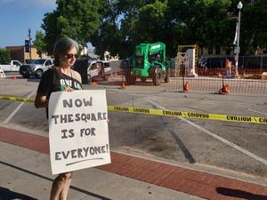 ["Now the square is for everyone" sign and removal of Confederate monument]