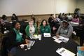 Photograph: [Women around table, 2014 E&D Conference]