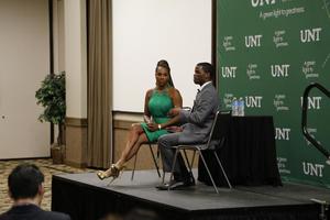 [Marcedes Fuller and woman on stage, 2014 E&D Conference 2]
